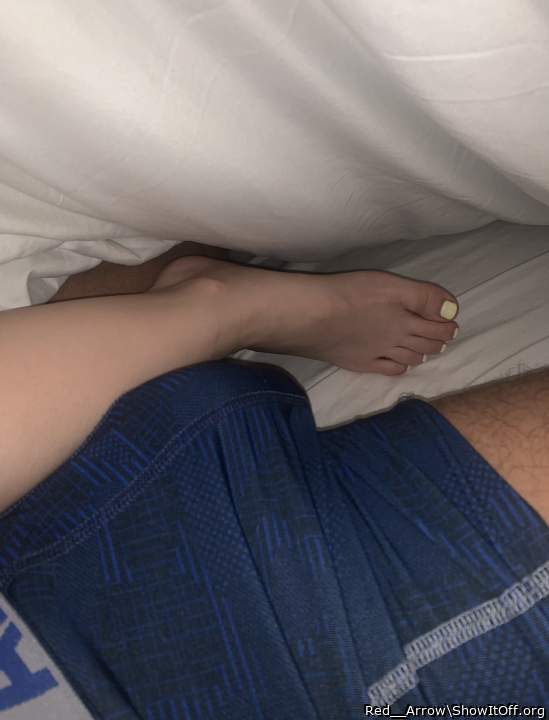 Her feet with my bulge