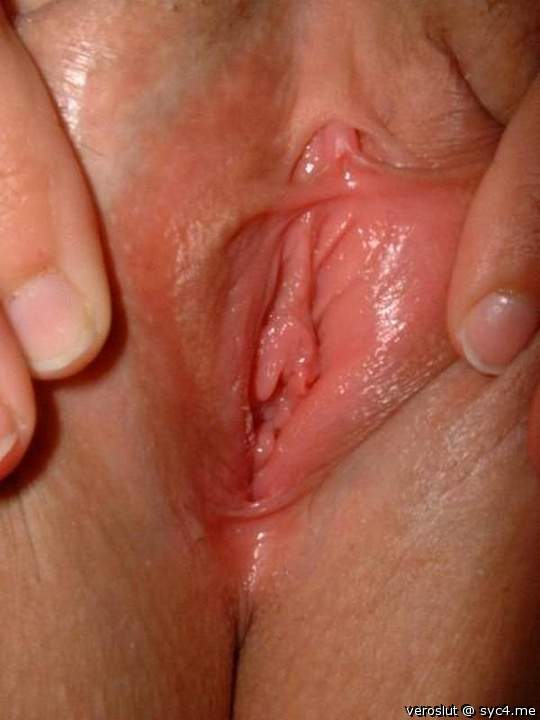 My spread open pussy. Look at my lil clit... it's very sensitive!