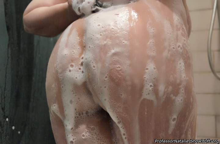 Your gorgeous round bum is so sexy all wet and soapy.    