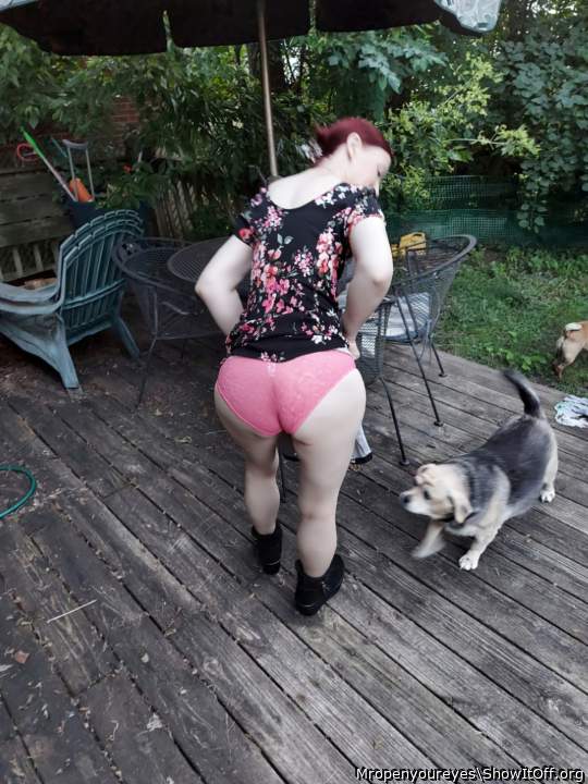 Erin flashing her panties out back on the patio for the neighbors