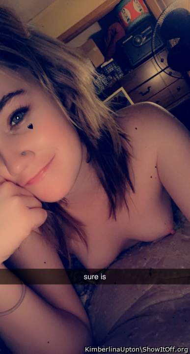 Sexy. Lovely looking tits peeking out