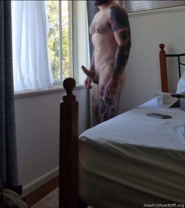 My husband looking at naked neighbour man in garden