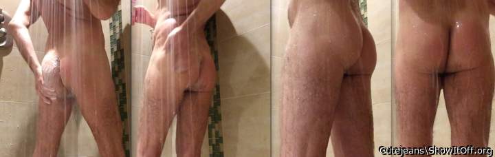 Looking very hot all wet in the shower.   