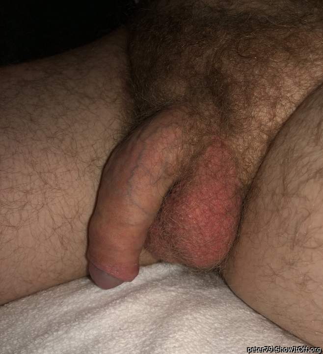 Great uncut cock and big balls just to hairy for me.