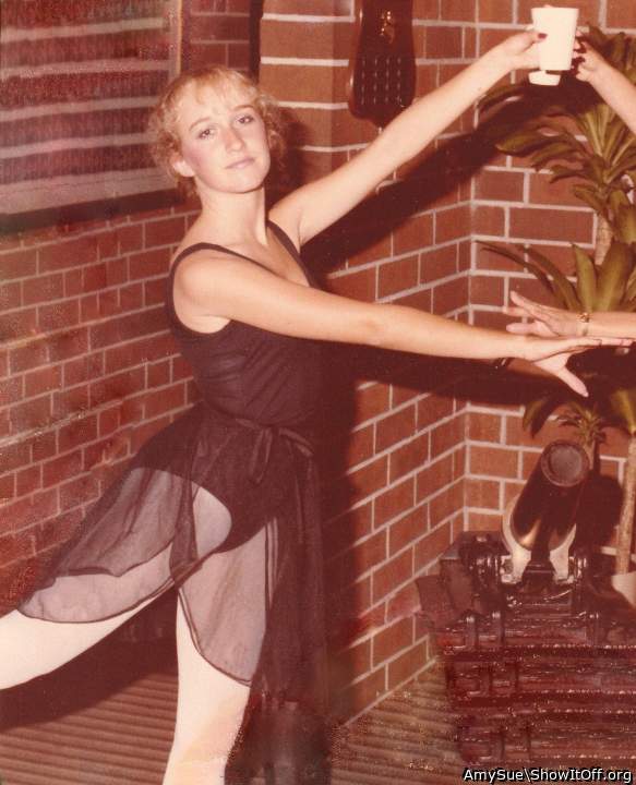 Posing at a frat party, to which I went as a danseuse.