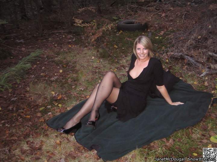 Janet McDougall black stockings and high heels in public