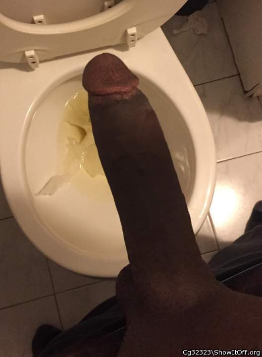 The toilet ruins the pic a little. But amazing cock 